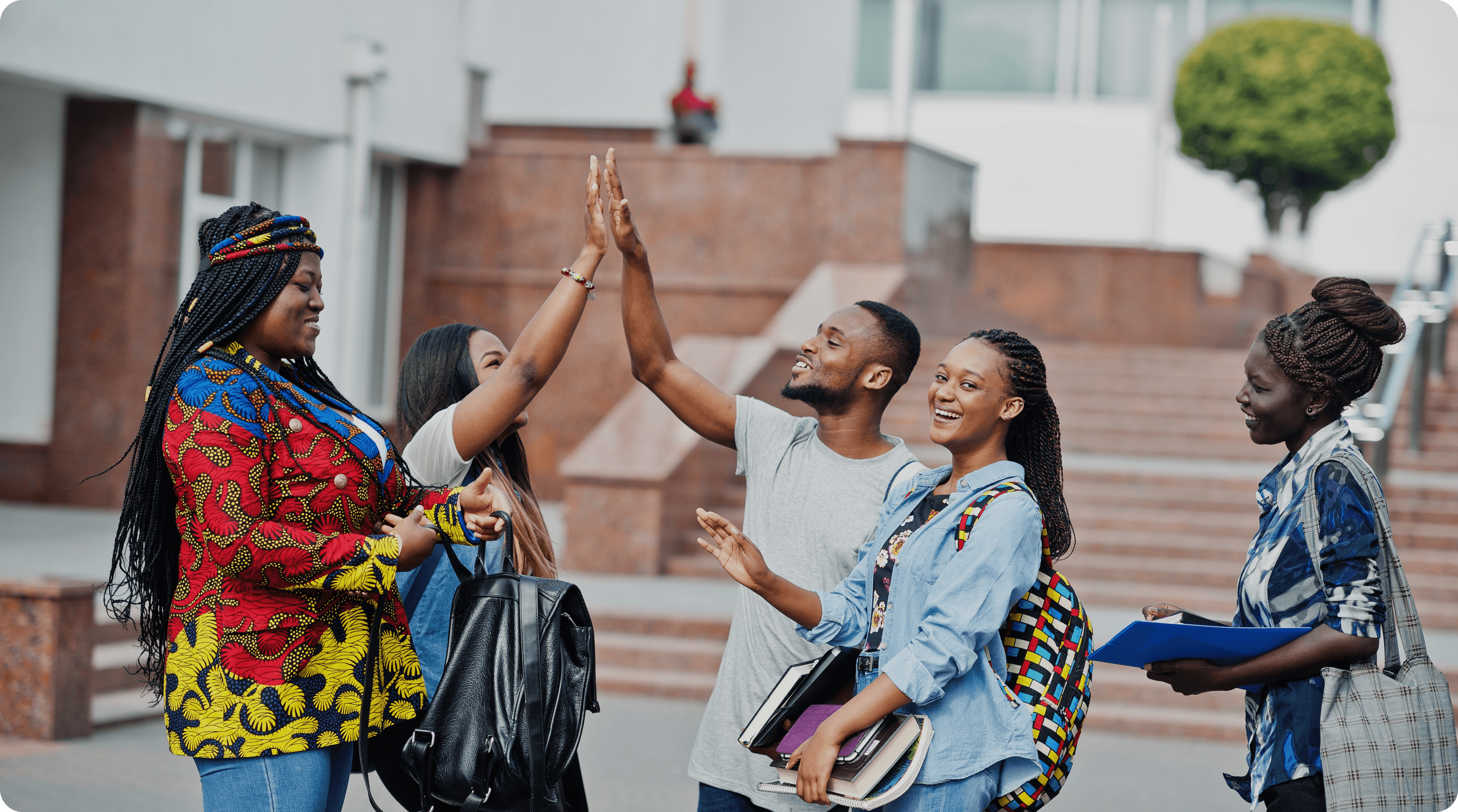 Group of students celebrating success